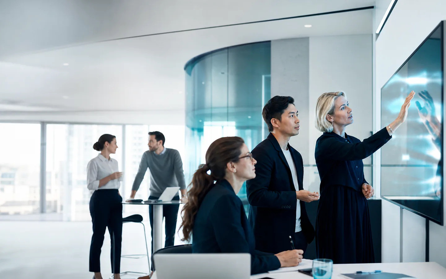 Enterprise teams working together with intelligent technology